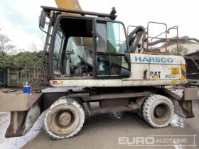 2014 CAT M322D MH Wheeled Material Handler, CV, Stabilisers, Piped, Hi Rise Cab, Demo Cage, 5 Tyne Scrap Grab, Electric Motor for Magnet, Reverse Camera, A/C Wheeled Excavators For Auction: Leeds, GB 12th, 13th, 14th, 15th June 2024 @ 8:00am