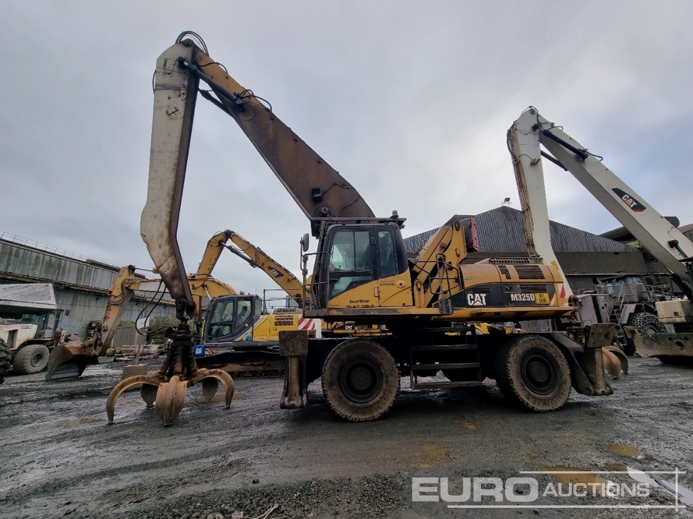 2009 CAT M325D LMH Wheeled Material Handler, CV, Stabilisers, Piped, Hi Rise Cab, Demo Cage, Hydraulic Rotating 5 Tine Grab, Reverse Camera, A/C Wheeled Excavators For Auction: Leeds, GB 12th, 13th, 14th, 15th June 2024 @ 8:00am