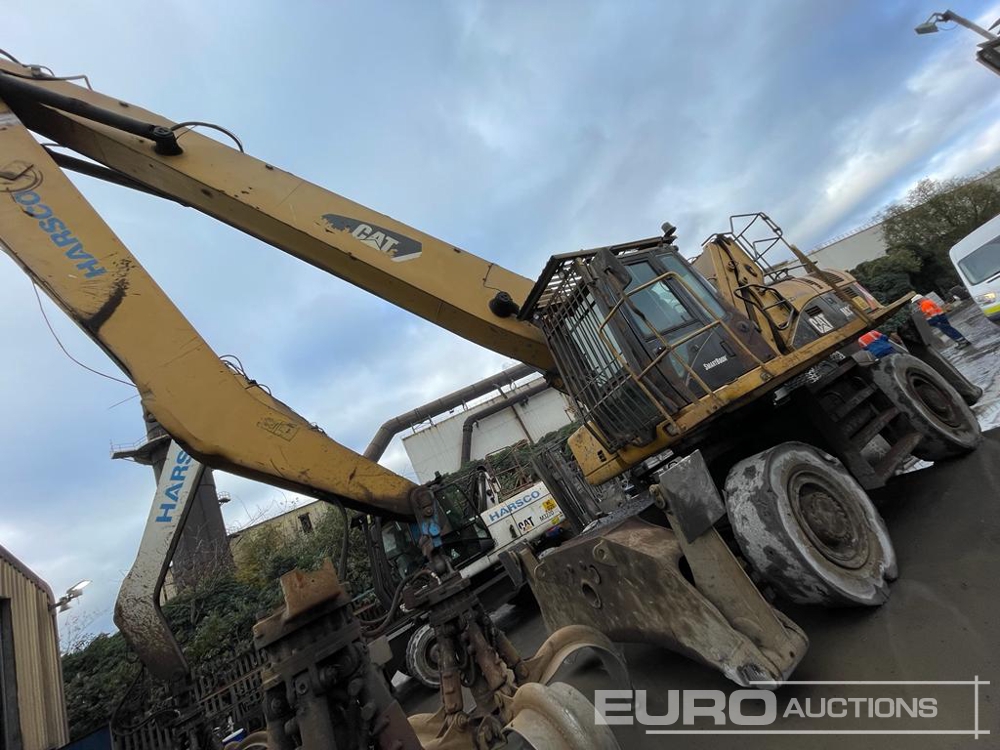 2011 CAT M325D LMH Wheeled Material Handler, CV, Stabilisers, Piped, Hi Rise Cab, Demo Cage, Hydraulic 5 Tine Grab, Reverse Camera, A/C Wheeled Excavators For Auction: Leeds, GB 12th, 13th, 14th, 15th June 2024 @ 8:00am
